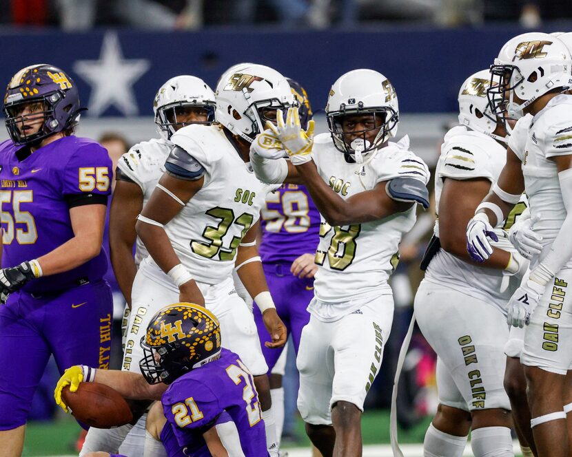 South Oak Cliff linebacker Brandon Jones (28) celebrates a tackle of Liberty Hill running...