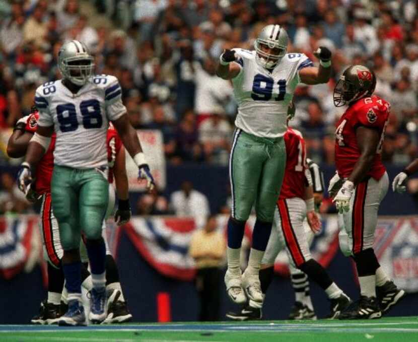 ORG XMIT: S0368379714_STAFF Dallas Cowboys  defender  (#91) Dimitrius Underwood  celebrates...