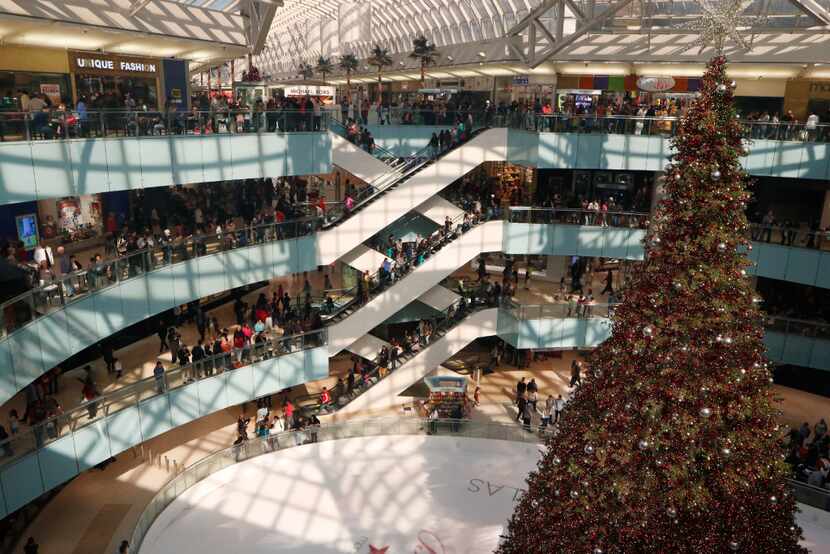 Galleria Dallas shoppers watched the Christmas tree lighting ceremonies on Black Friday....