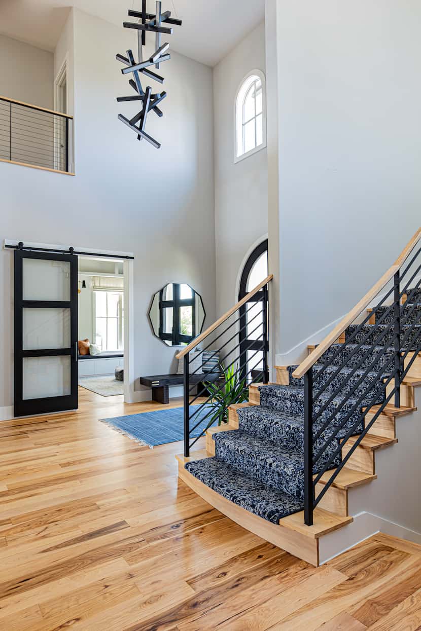A large, two-story entry can be tricky to design. Designer Michelle Lynne suggests a...