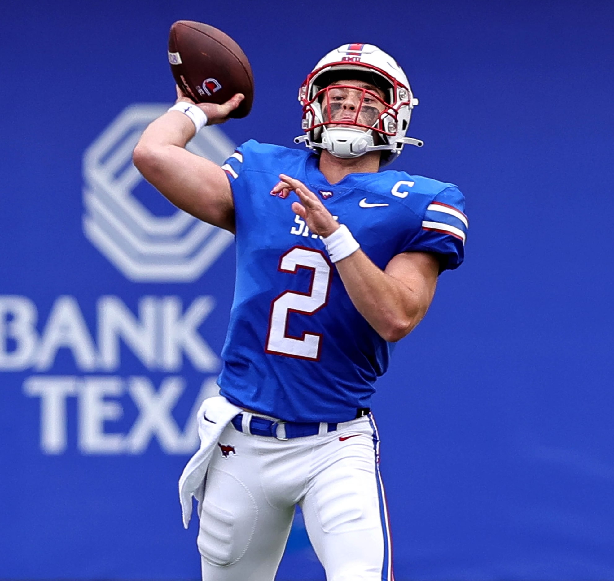 SMU quarterback Preston Stone attempts a long pass against Tulsa during the first half of an...