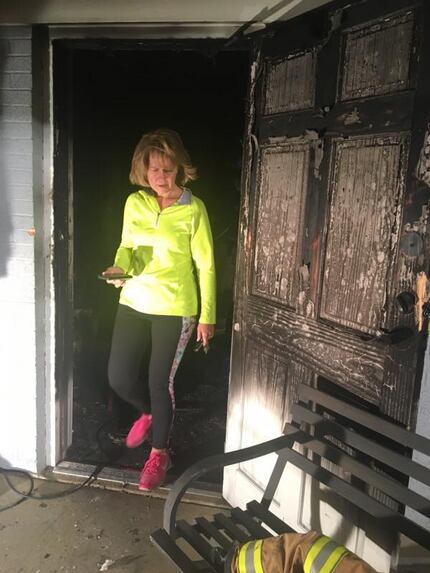 Grace Grapevine Executive Director Shonda Schaefer surveys fire damage at the nonprofit's...