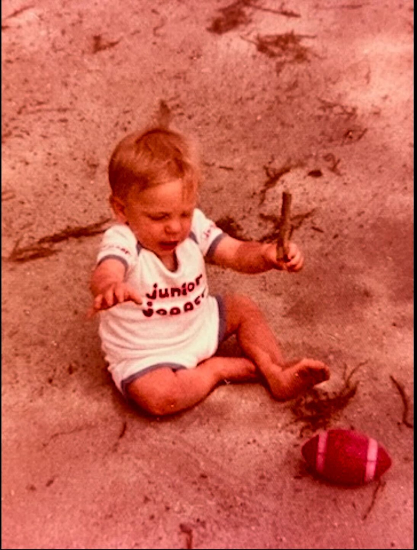 Even as a baby, Mike Elko was never far from football.