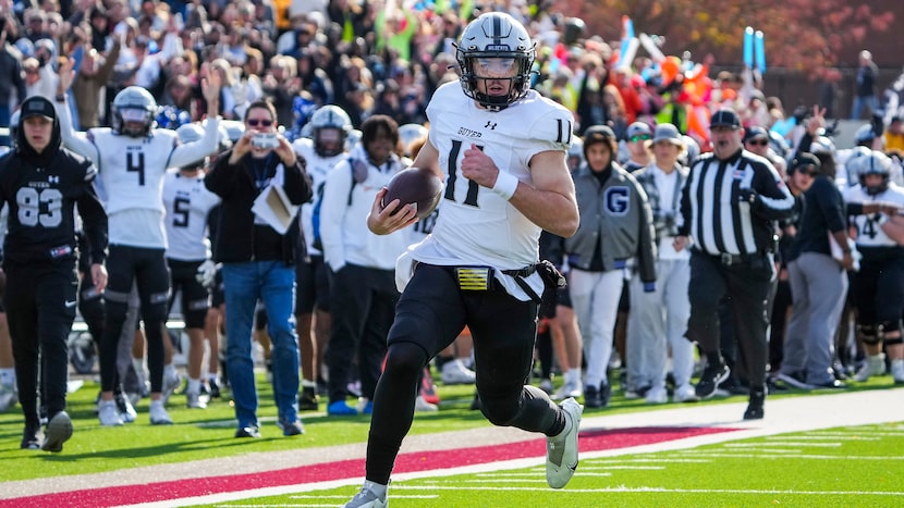 Denton Guyer quarterback Jackson Arnold (11) races down the sidelines on a 49-yard touchdown...