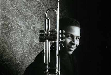 A young Roy Hargrove poses with a trumpet in this undated record label handout photo. (DMN...