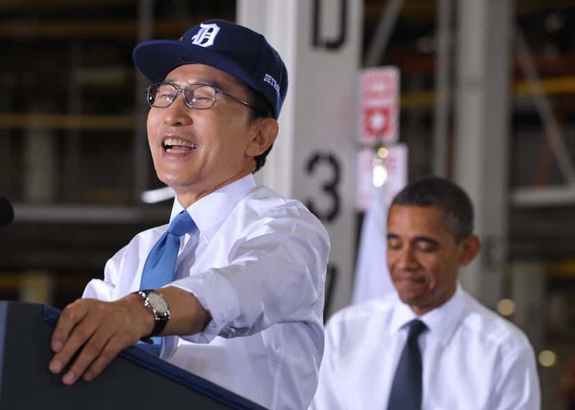 South Korea's President Lee Myung-Bak speaks as  US President Barack Obama looks on...