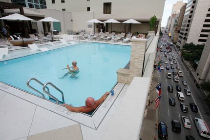 Hotel guests Sam High (left) and Jason Cook, both of Little Rock, Ark., enjoyed the new pool...