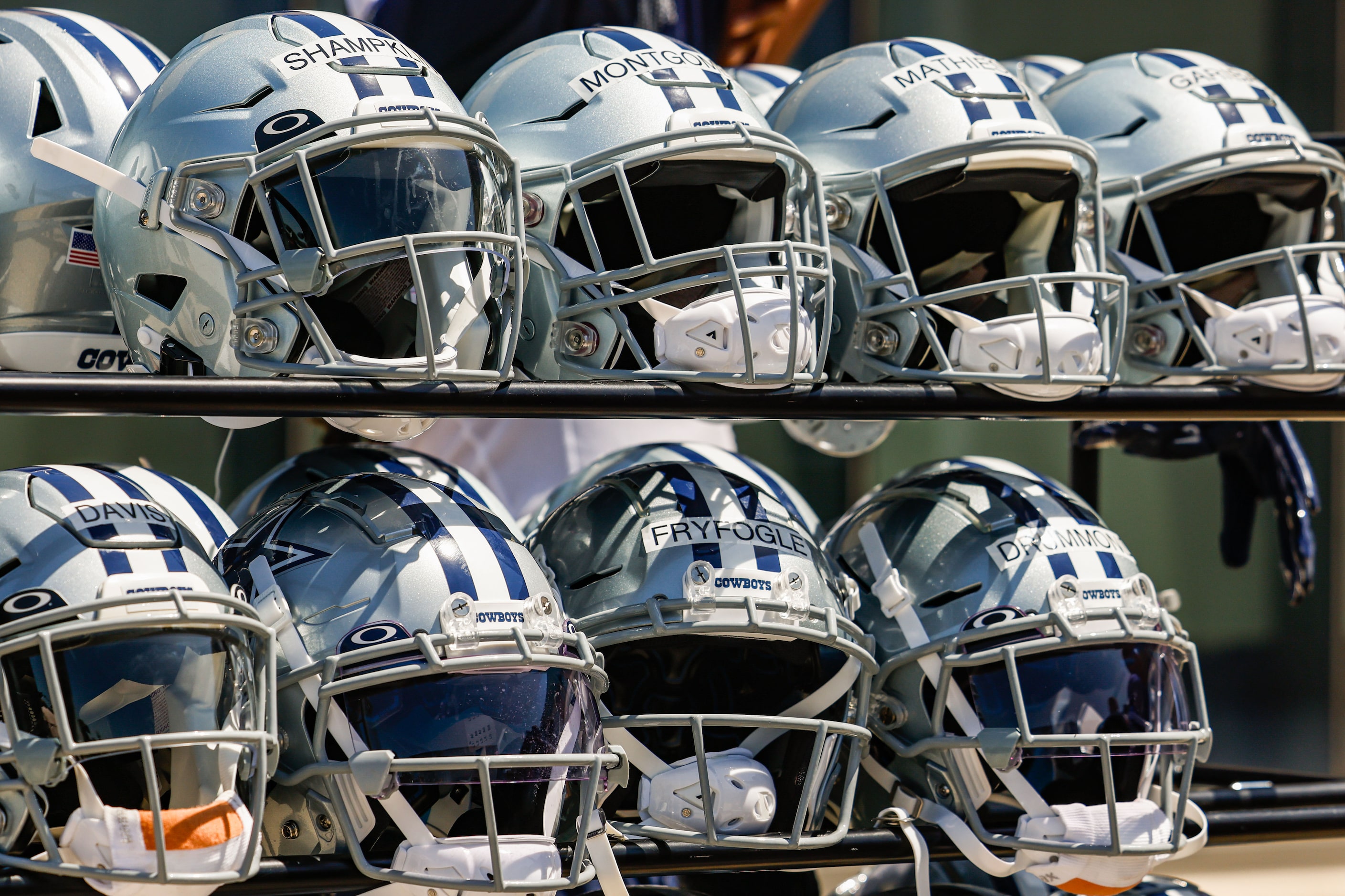 Dallas Cowboys helmets rest on a shelf after a Cowboys rookie minicamp at The Star in...