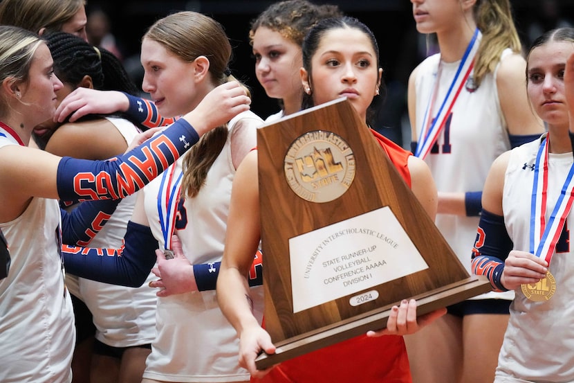 McKinney North's Gabi Rodriguez holds the second place trophy after the UIL Class 5A...