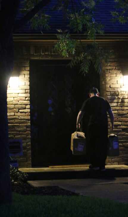 Amazon.com's Carlos Cepeda delivers groceries on Clayco Drive in the Lake Highlands area of...