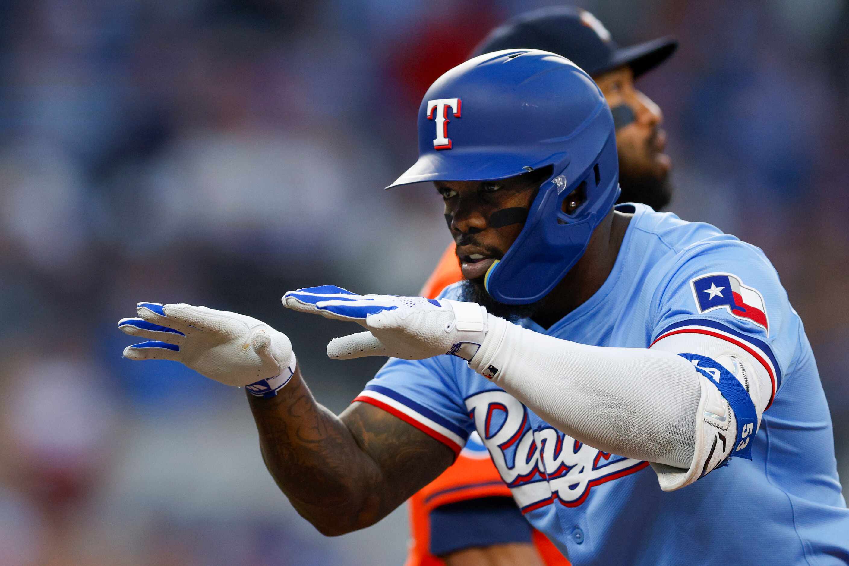 Texas Rangers right fielder Adolis García (53) celebrates after a hit breaks up a no-hitter...