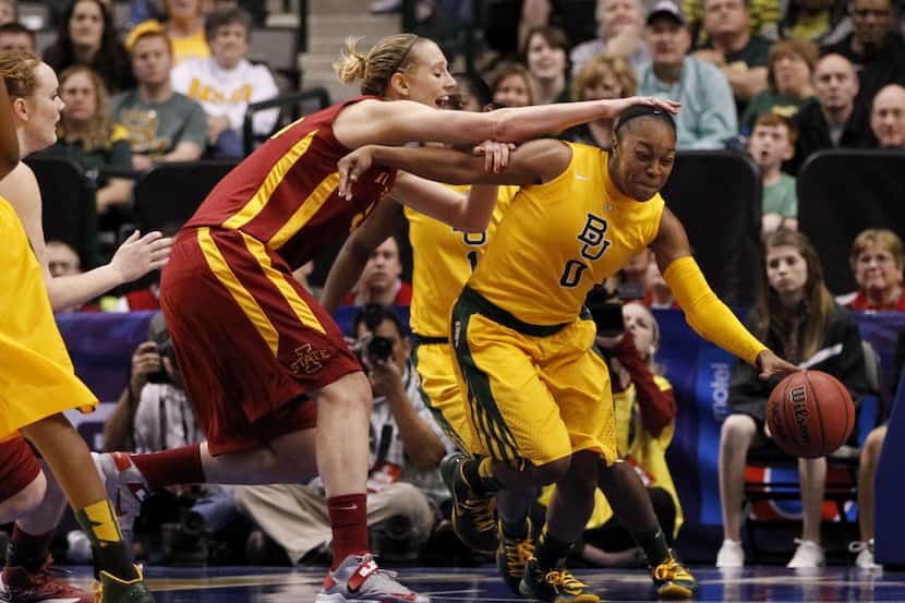 Iowa State Cyclones center Anna Prins (55) taps the head of Baylor Bears guard Odyssey Sims...
