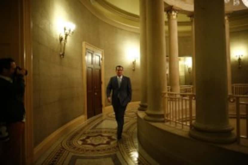  In this file photo, Sen. Ted Cruz of Texas is seen walking in the Capitol.