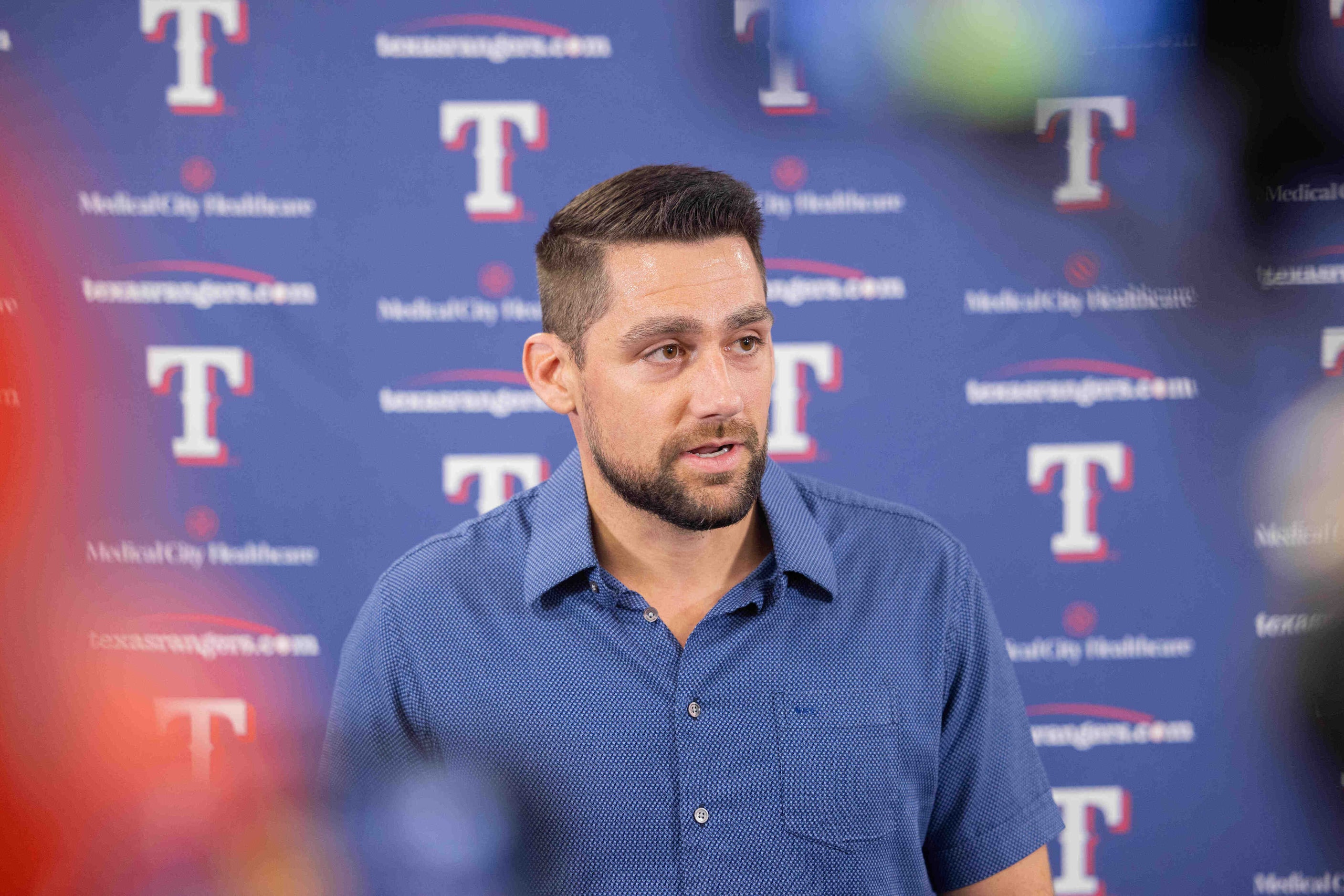 Texas Rangers starting pitcher Nathan Eovaldi speaks during a press conference announcing...