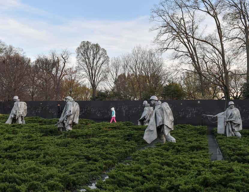 The Korean War Veterans Memorial features statues of 19 poncho-wearing soldiers on patrol.