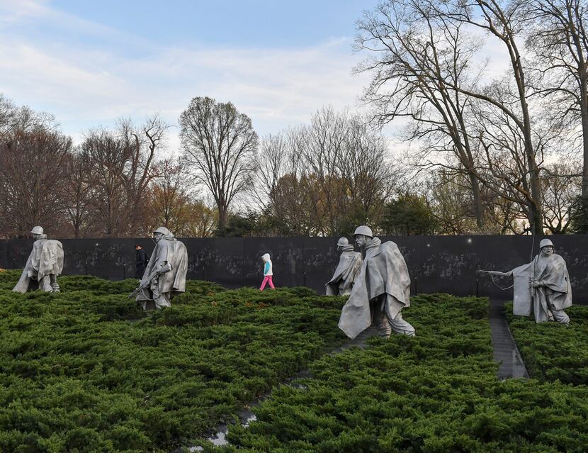 The Korean War Veterans Memorial features statues of 19 poncho-wearing soldiers on patrol.