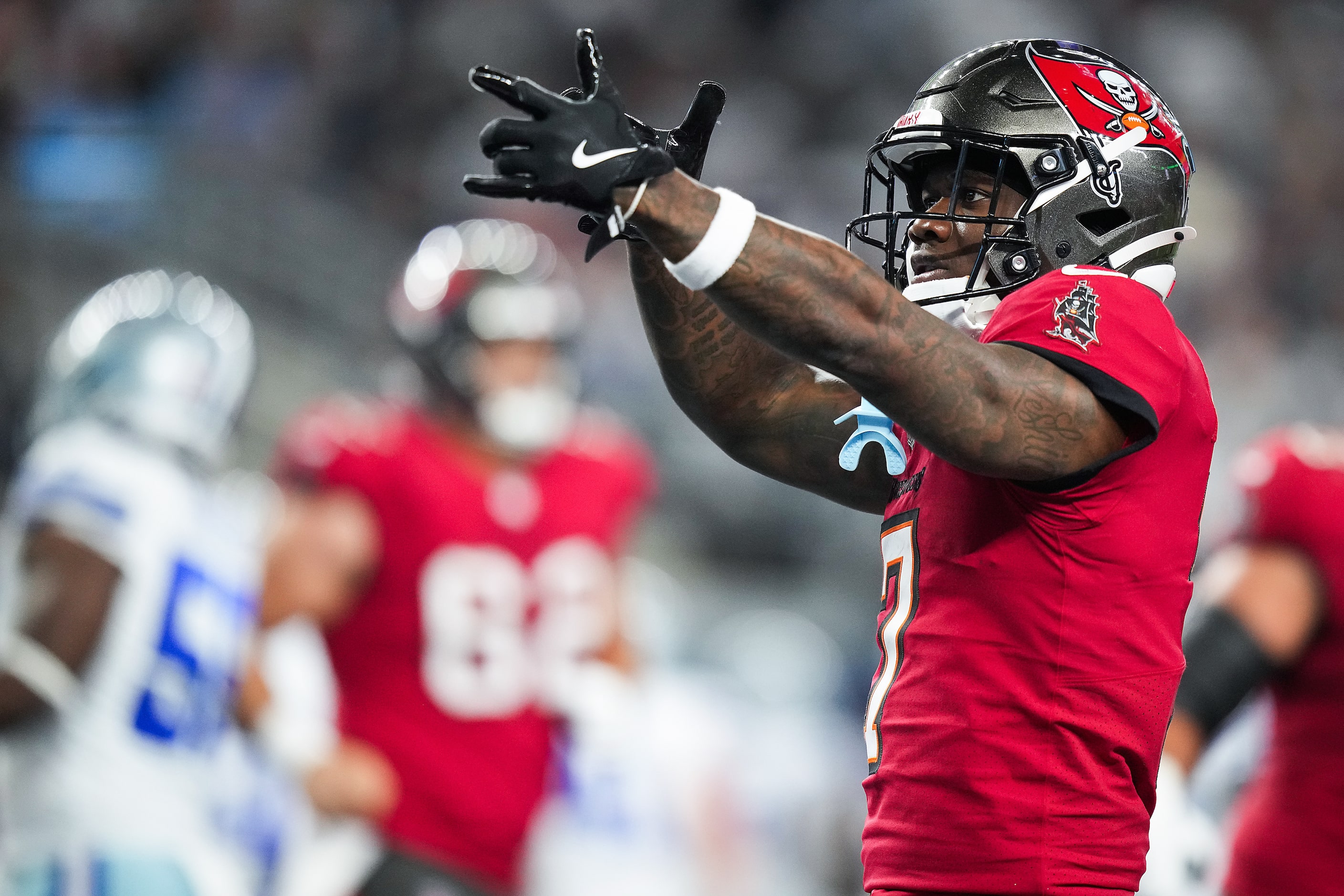 Tampa Bay Buccaneers running back Bucky Irving (7) celebrates after scoring a touchdown...