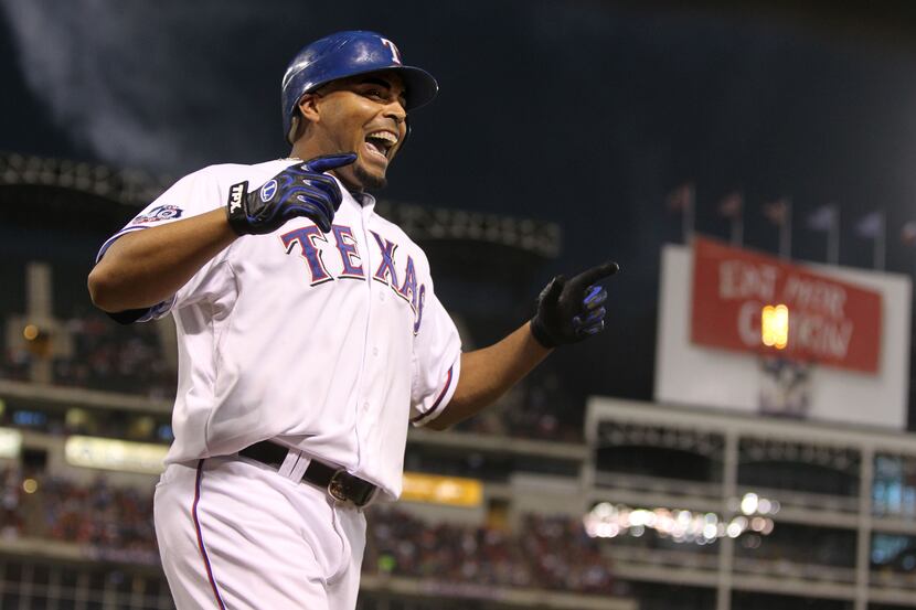 Rangers right fielder Nelson Cruz celebrates his fourth-inning home run.