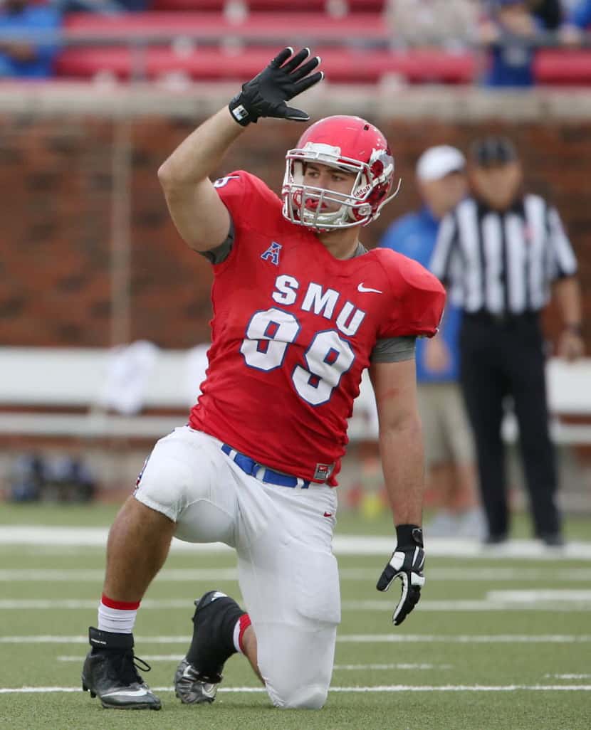 Southern Methodist Mustangs defensive end Justin Lawler (99) before a play during an NCAA...