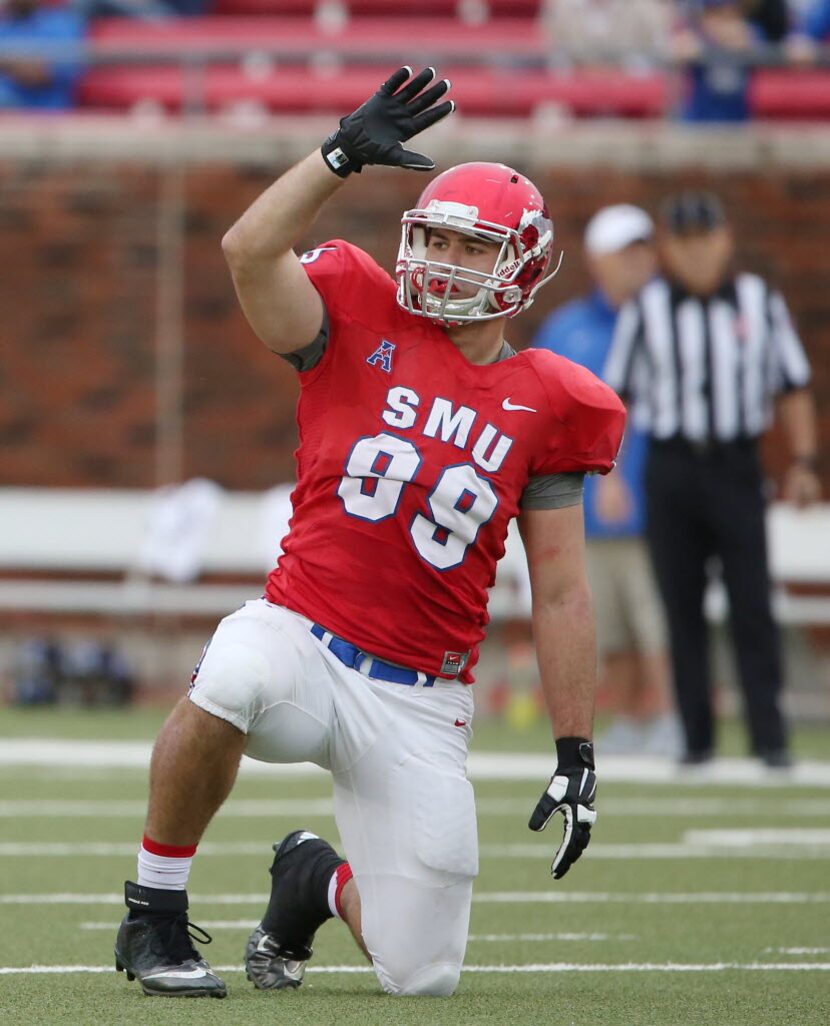 Southern Methodist Mustangs defensive end Justin Lawler (99) before a play during an NCAA...