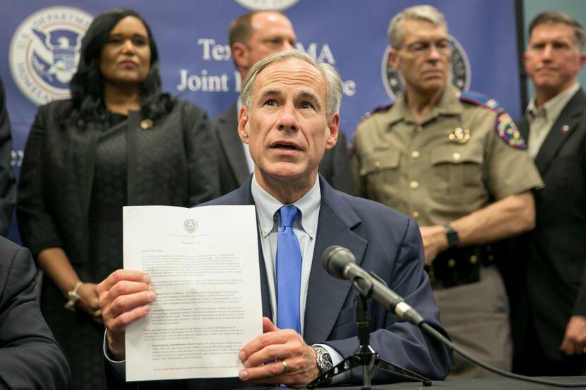 Texas Gov. Greg Abbott speaks about Hurricane Harvey recovery efforts at a news conference...