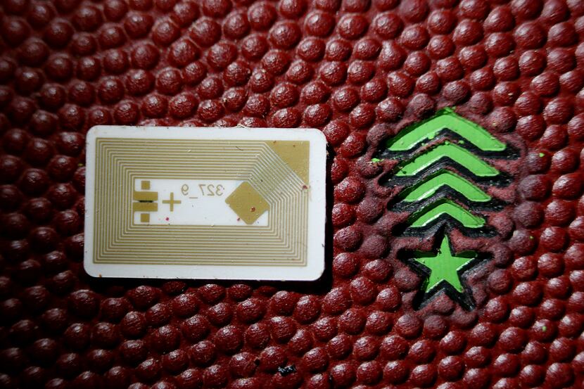 The "gametag" microchip used by Big Game and inserted into footballs inside its factory in...