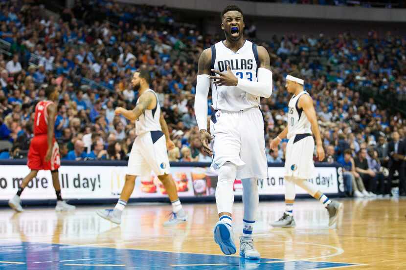 Dallas Mavericks guard Wesley Matthews celebrates after making a basket during the second...