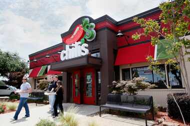  Customers exit a Chili's restaurant, on Friday, June 20, 2014 in Dallas. Ben Torres/Special...