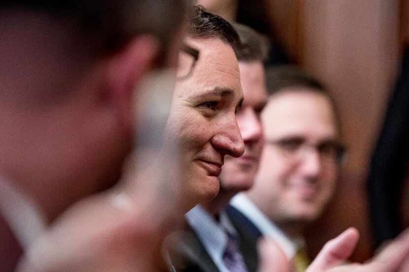 Sen. Ted Cruz, R-Texas, center, attends a swearing in ceremony for Energy Secretary Rick...