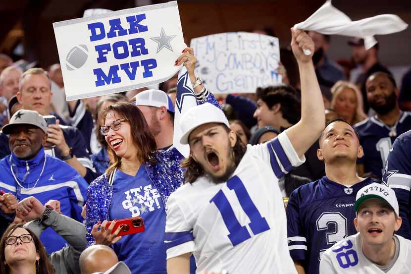 A Dallas Cowboys fan cast her vote for quarterback Dak Prescott as MVP during the fourth...