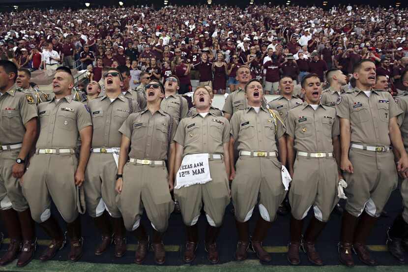 Texas A&M cadets and fans take part in a yell before the Aggies' 49-42 loss to Alabama...