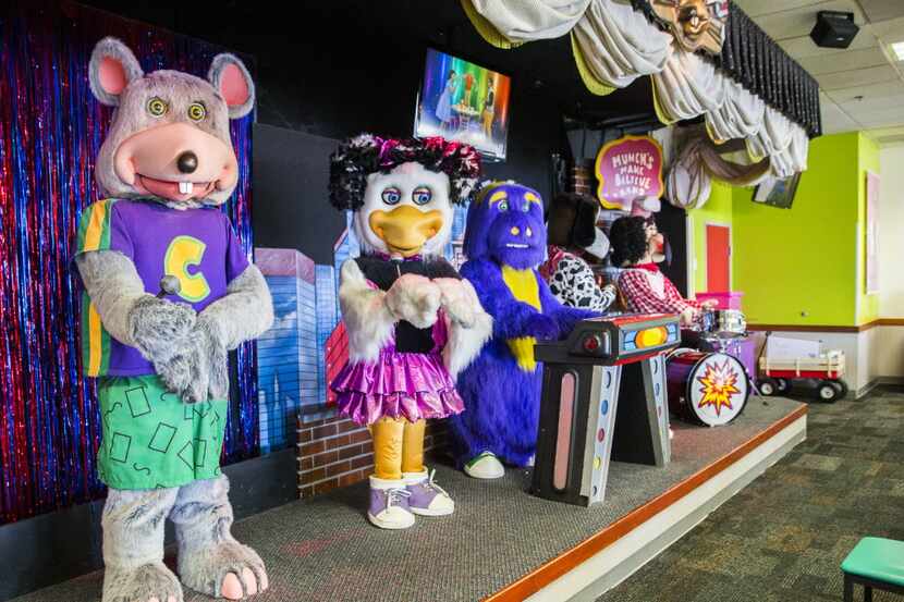 Animatronic characters dance on a stage at Chuck E Cheese on Wednesday, April 8, 2015 in...