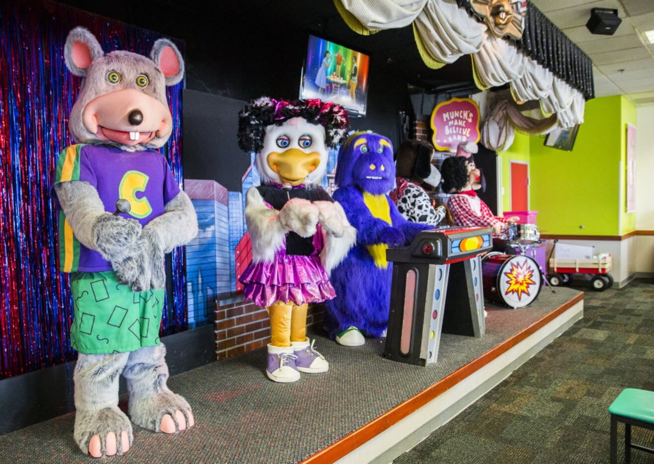 Animatronic characters dance on a stage at Chuck E Cheese on Wednesday, April 8, 2015 in...