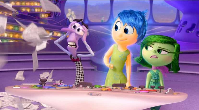 A scene from "Inside Out" showing Anger, from left, (voiced by Lewis Black), Joy (Amy...