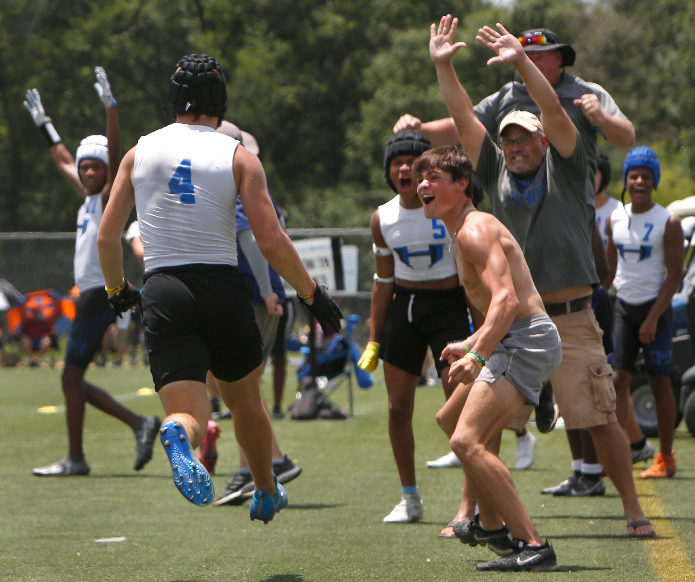 Hebron defender Matthew Howard (4) ignited the Hawks sideline after making an interception...