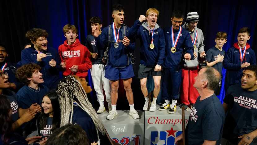 Braxton Brown of Allen (top center) leads the combined boys and girls teams in celebration ...