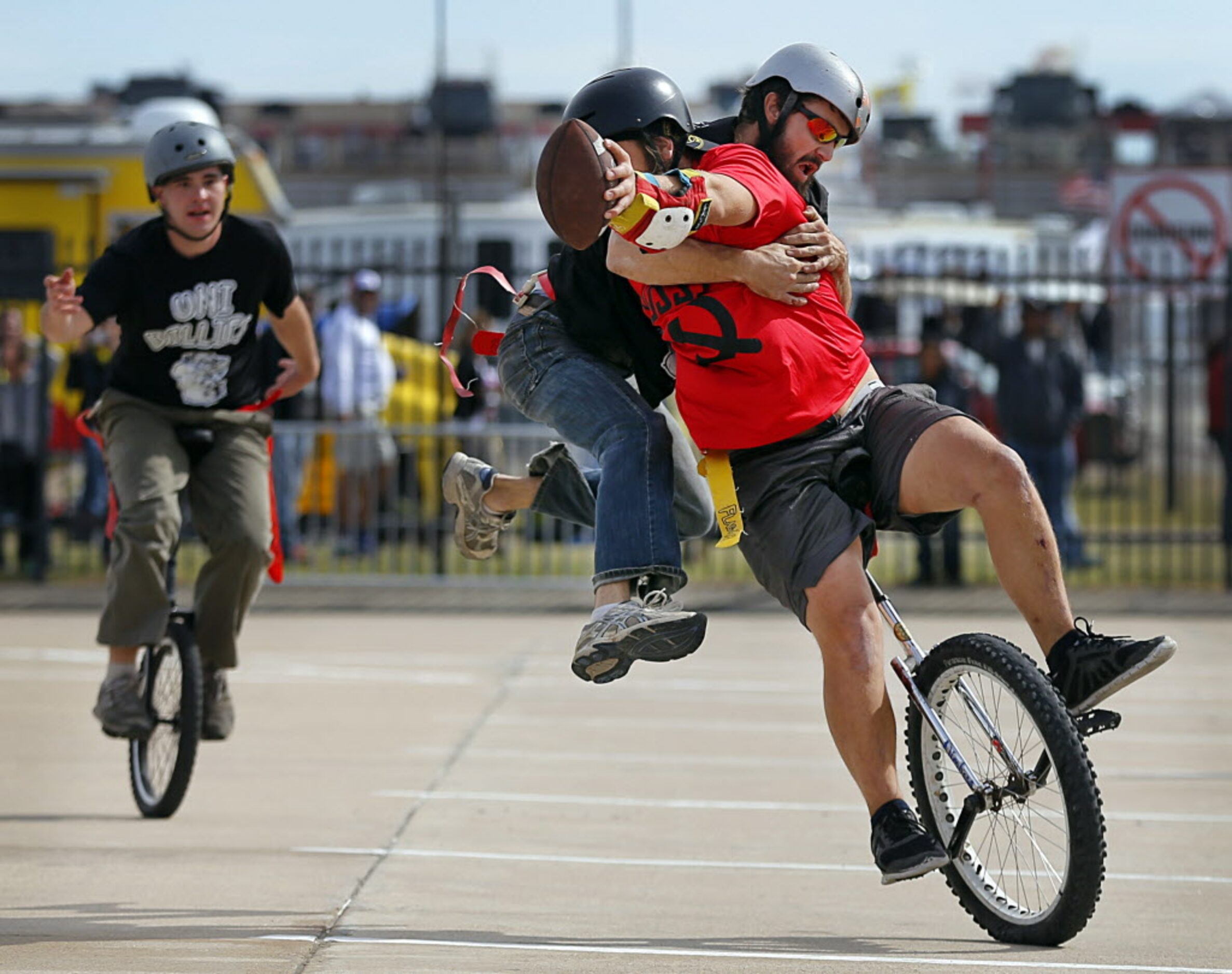 Uni Billies Chance 'Crazy Horse' Whited makes a flying tackle onTeam Russia's Dan Walter who...