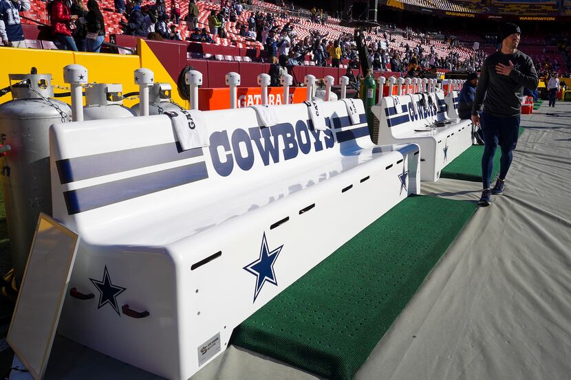 Towels are set out on the Dallas Cowboys bench before an NFL football game against the...