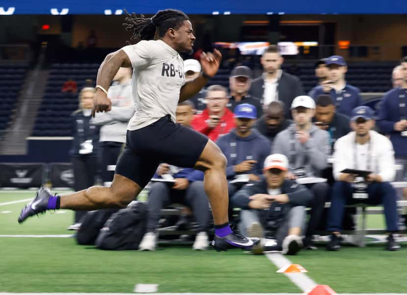 TCU running back Emani Bailey raced past NFL scouts who were timing his 40-yard-dash during...