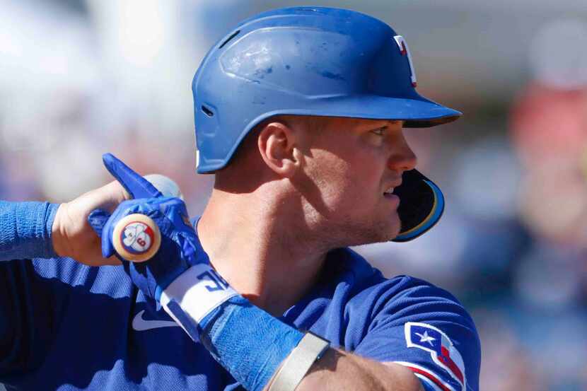 Texas Rangers third baseman Josh Jung gets set to hit during the sixth inning of a spring...