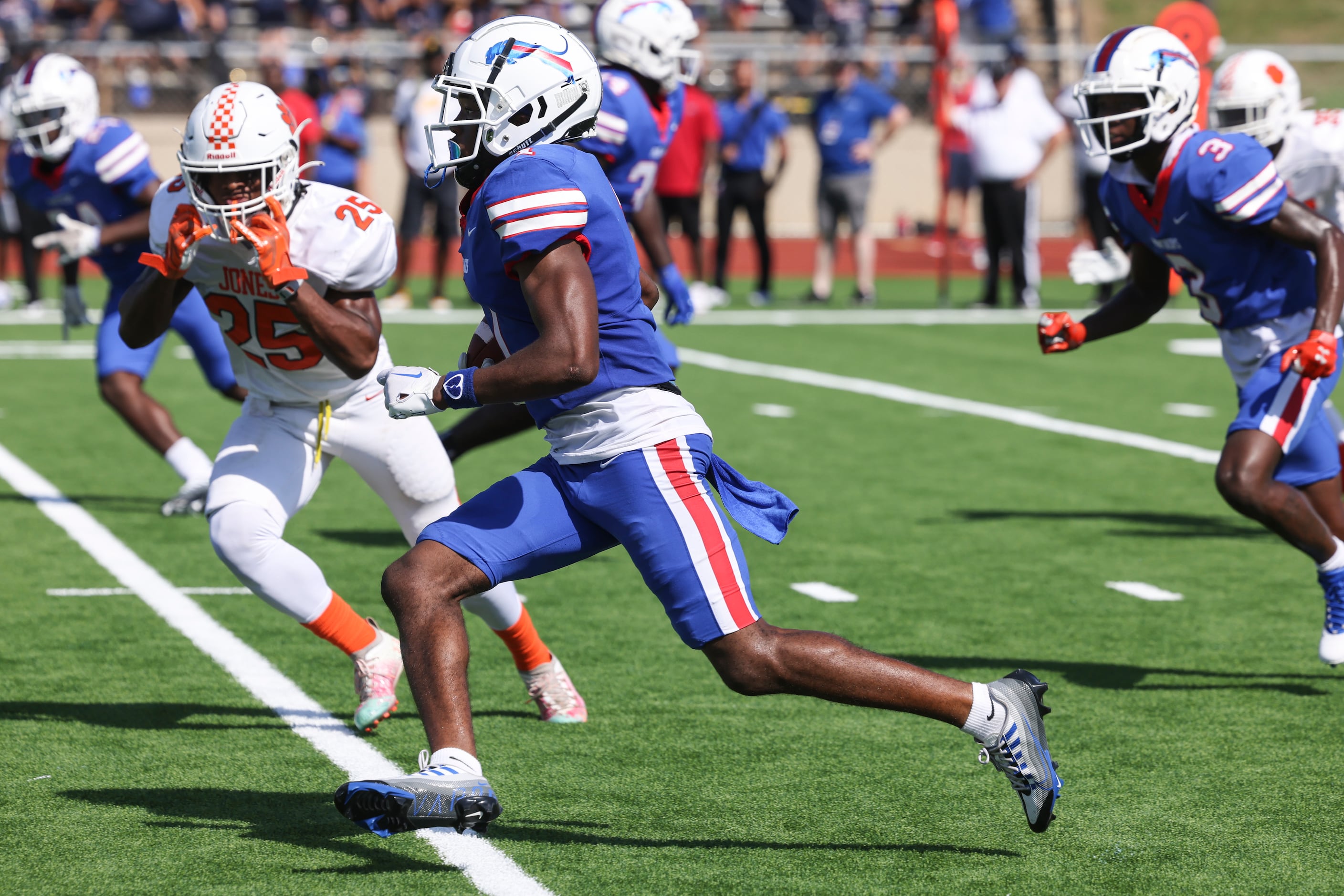 Duncanville High School Lontrell Turner (1) carries the ball up the field during the game...