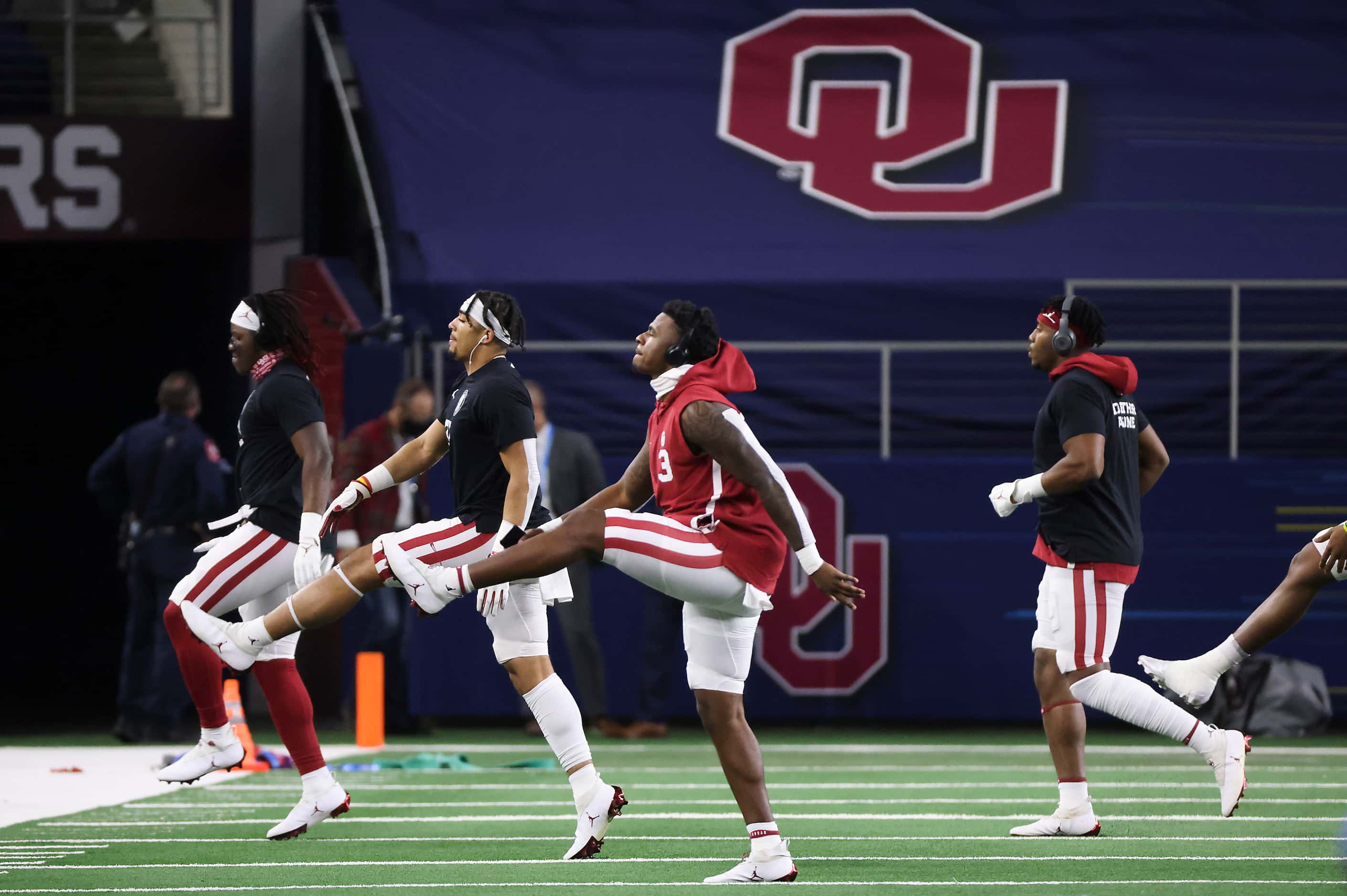 Oklahoma players warm up before the Cotton Bowl Classic against Florida at AT&T Stadium on...