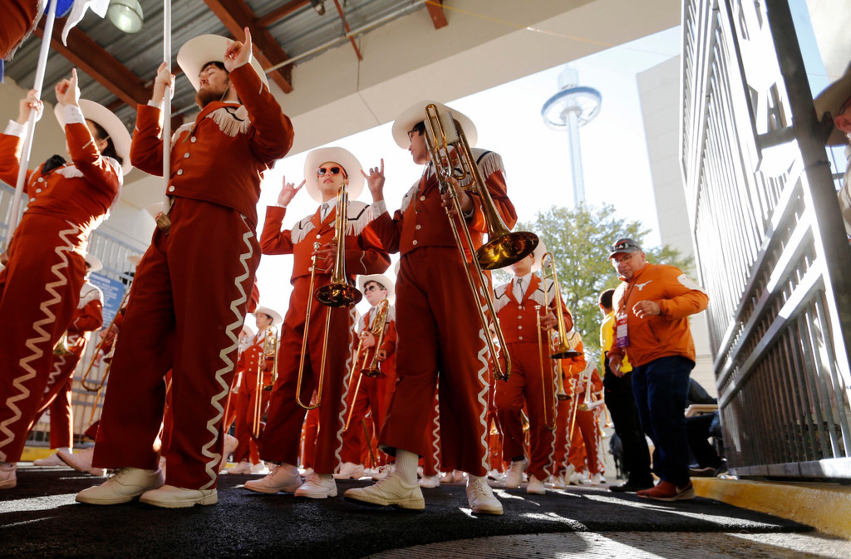 Texas Longhorns marching band enters the stadium before a game against Oklahoma Sooners in...