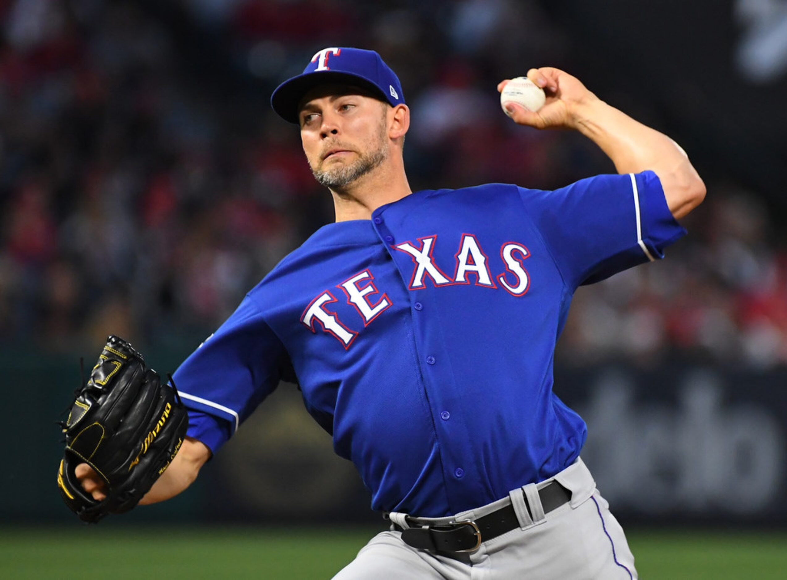 ANAHEIM, CA - MAY 25: Mike Minor #23 of the Texas Rangers pitches in the third inning of the...