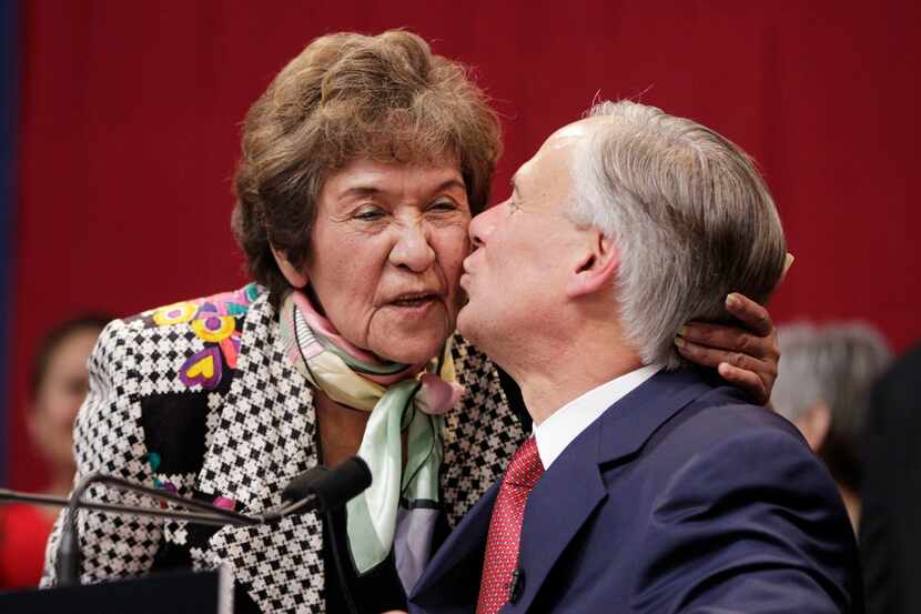 Mary Lucy Phalen, shown receiving a kiss from her son-in-law Greg Abbott on the night in...