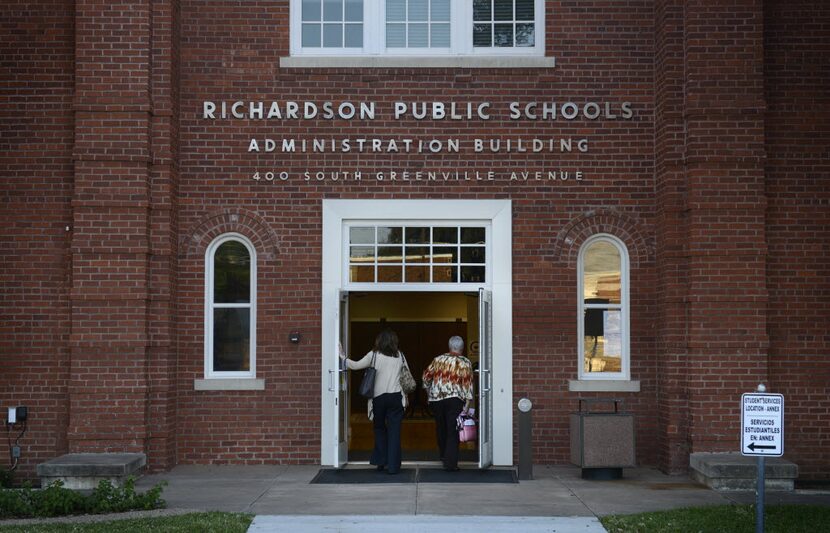 Richardson ISD school board of trustee members Kristin Kuhne (left) and Lanet Greenhaw walk...