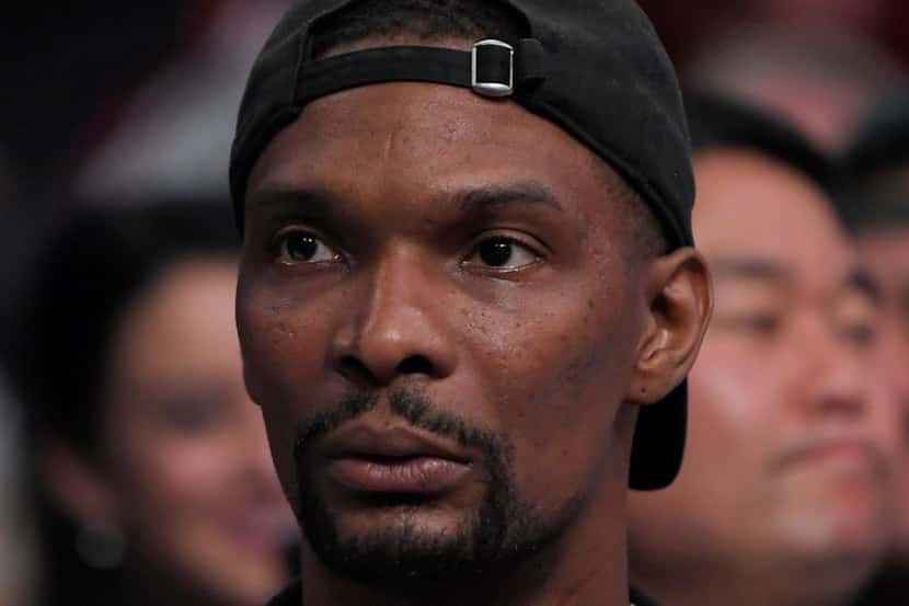 Chris Bosh watches during the second half of a game between the Los Angeles Lakers and the...