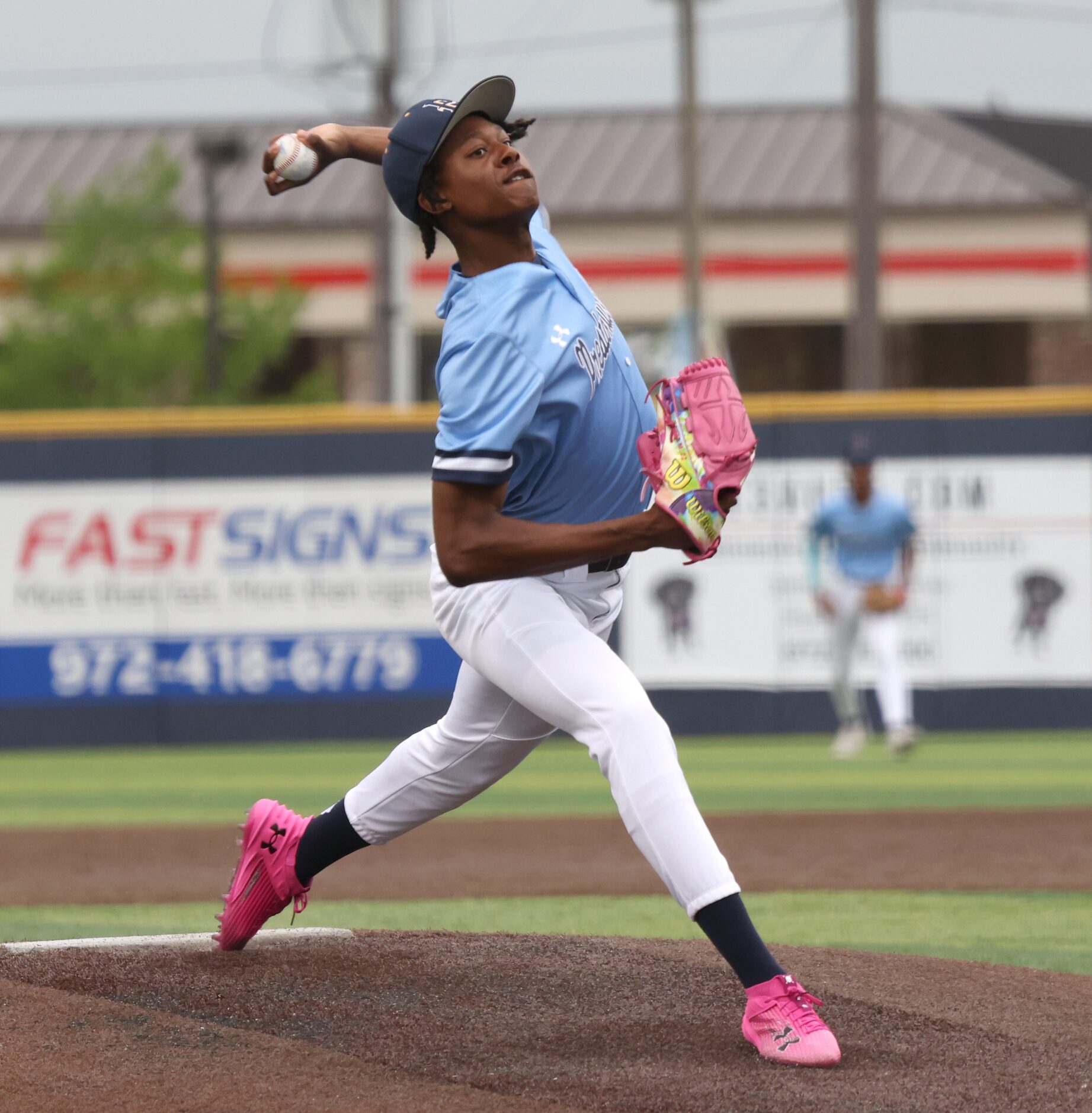  Prestonwood pitcher Xavier Mitchell (22) delivers a pitch to a Parish Episcopal batter...