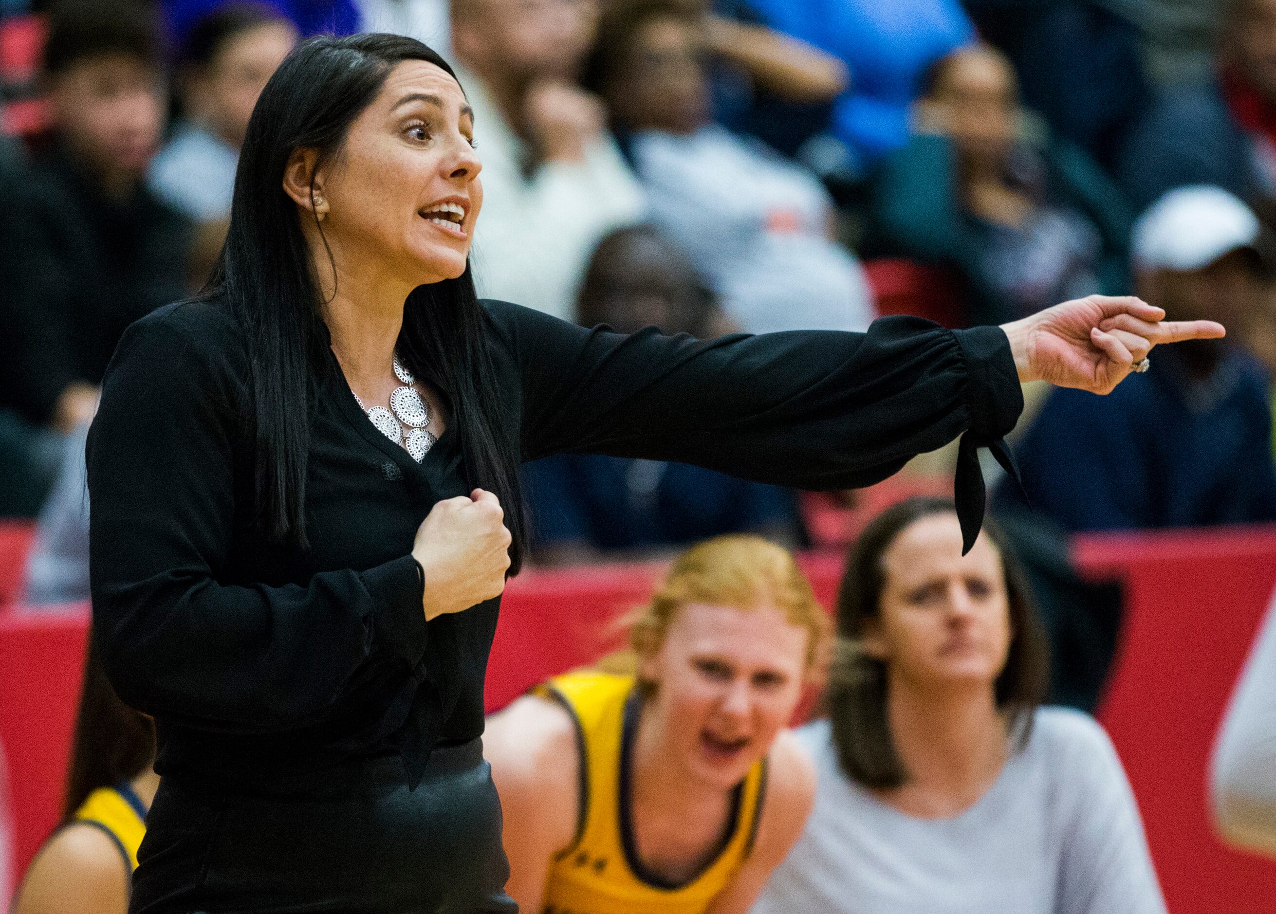 Highland Park head coach Nicole Fleming disputes a call during the fourth quarter of a Class...