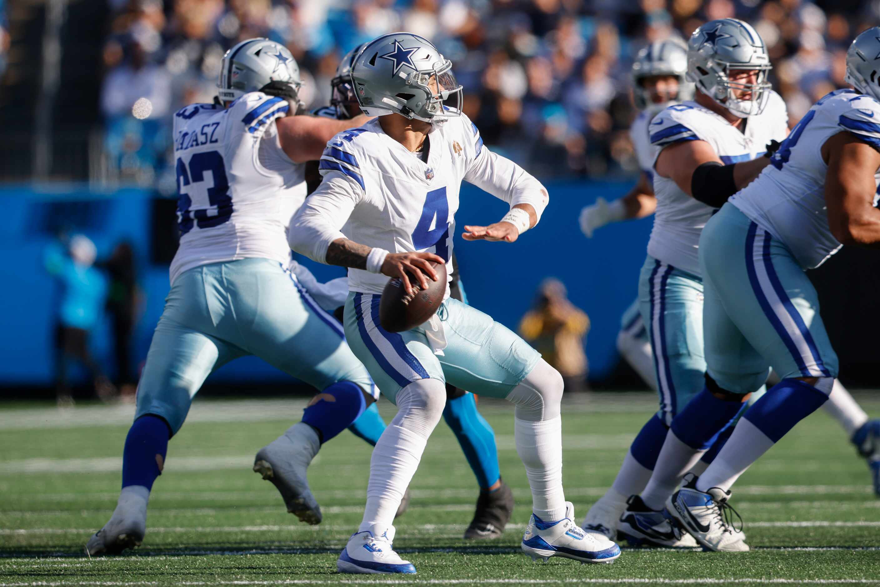 Dallas Cowboys quarterback Dak Prescott (4) prepares to throw during the third quarter of a...